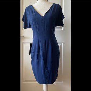 Bebe back hem peplum dress